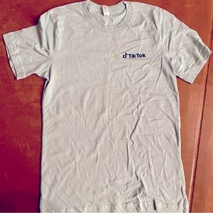 TikTok branded 100% cotton t-shirt blue. NWOT.